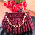 Borsa con manici in metallo