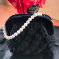 Borsa con manico in perle